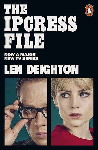 "The IPCRESS File" (1962) by Len Deighton shows the readers the nameless British intelligence agent referred to as Harry Palmer. 

Obliged to research a mysterious organization, which carries out experiments with brainwashing, Palmer has to move through a maze of secrets, spies, and machinations. 

The novel has attracted attention because Deighton was among the pioneering writers of realistic spy novels, not interested in romantic adventure as much as in strategy, deception, and personal price. It's an indispensable addition to the list of all who want to understand the nuances of the work of the intelligence community due to an unusual fact about the genre of the novel. spy novels